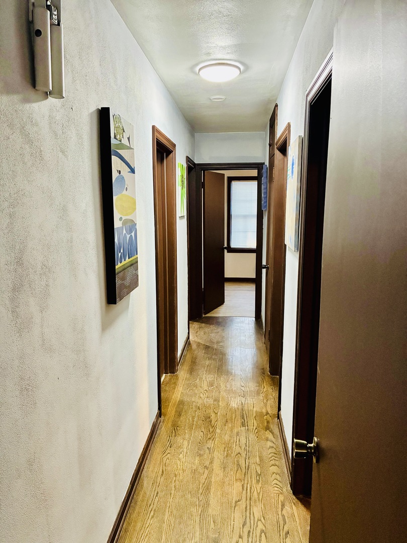 14506 Clinton Street Harvey, IL 60426 - Photo 4 of 12 a view of gallery with hallway