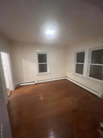 a view of an empty room with window