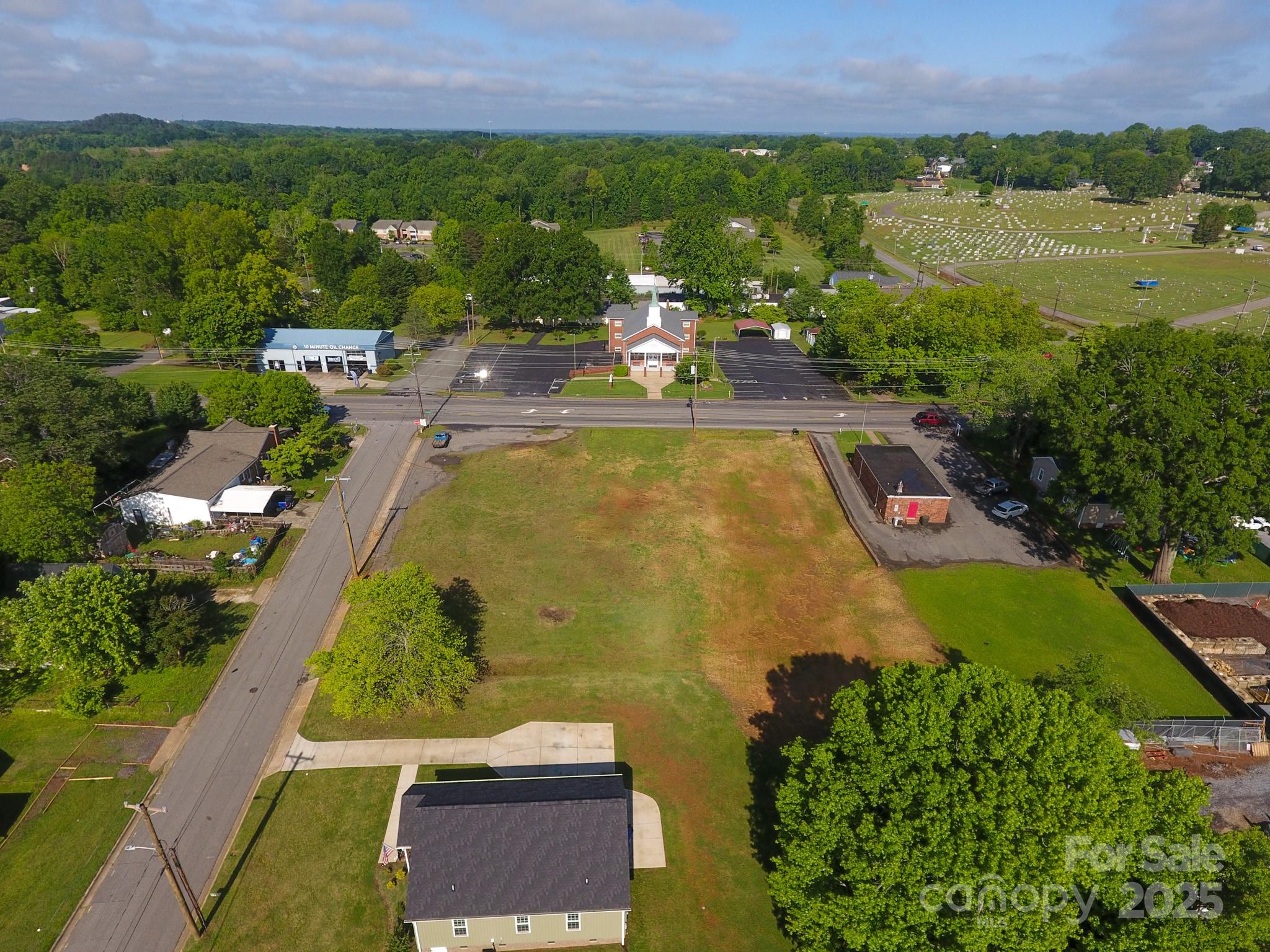 309 York Road Kings Mountain, NC 28086 - Photo 4 of 9 an aerial view of residential houses with outdoor space
