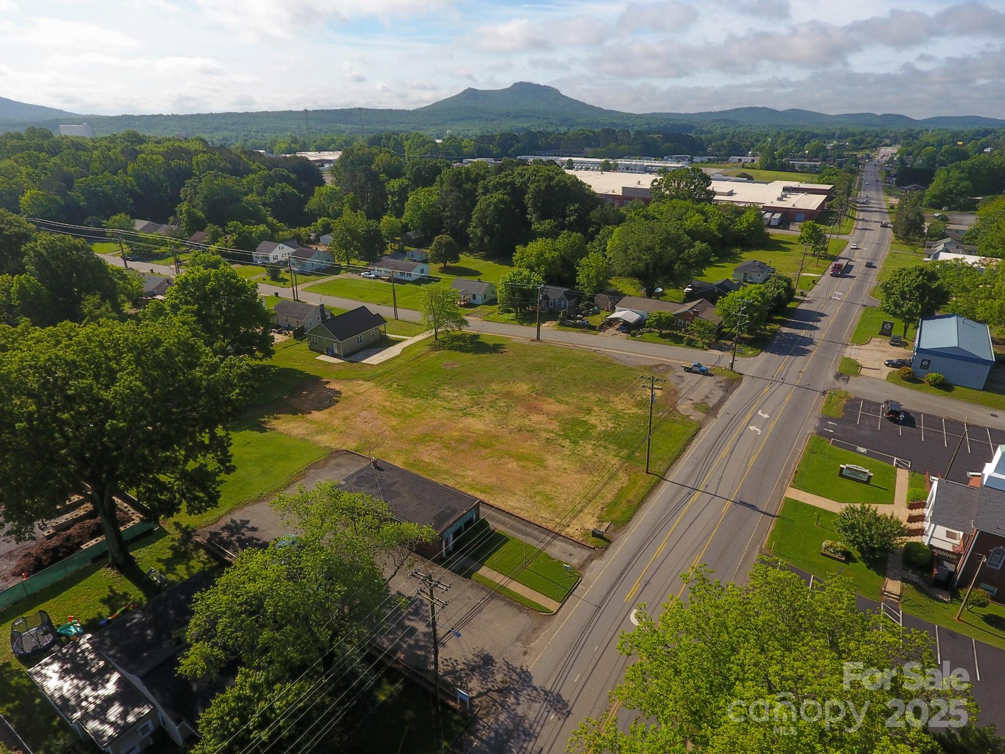 309 York Road Kings Mountain, NC 28086 - Photo 7 of 9 an aerial view of residential houses with outdoor space