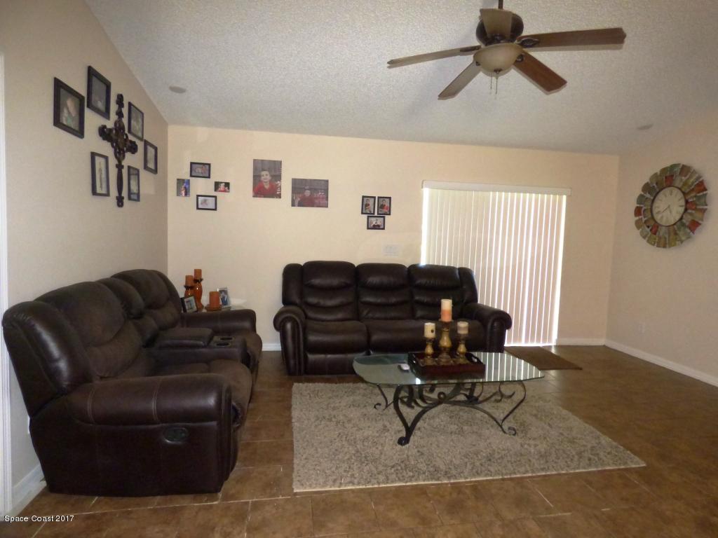 841 Garvey Road Palm Bay, FL 32908 - Photo 15 of 27 Family Room - Slider to Patio Slab