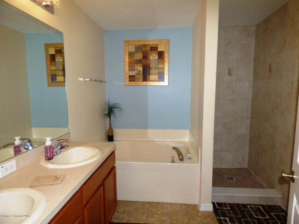 841 Garvey Road Palm Bay, FL 32908 - Photo 17 of 27 Master Bath - Garden Tub & Tiled Shower