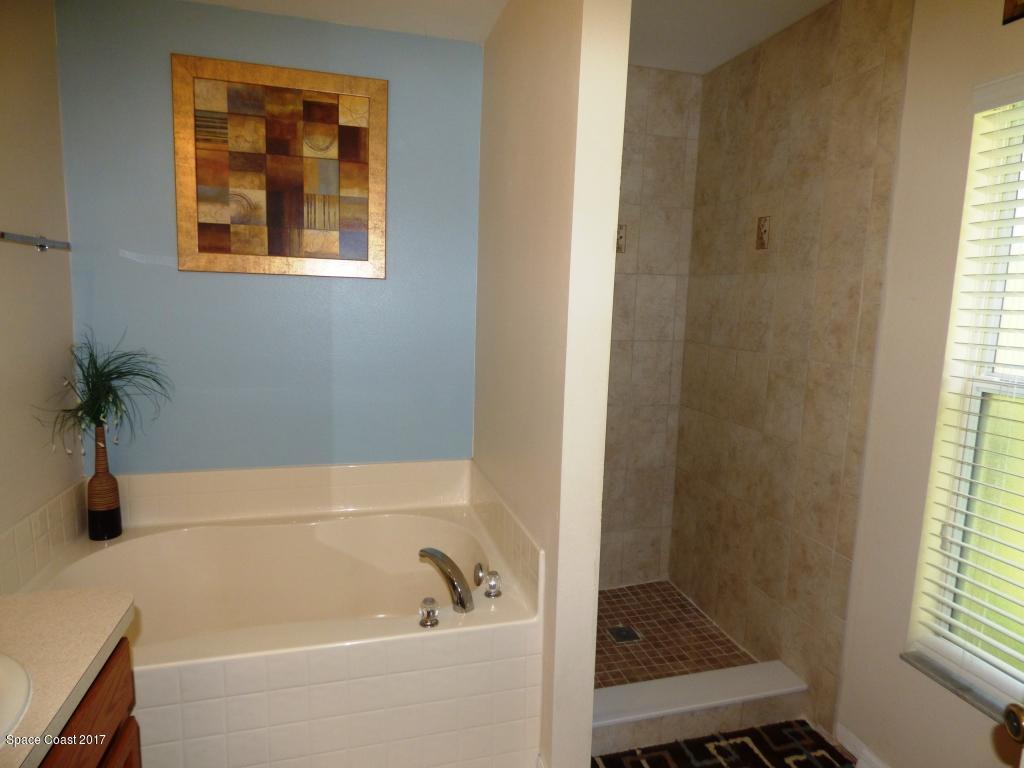 841 Garvey Road Palm Bay, FL 32908 - Photo 18 of 27 Close-up of Tub & newly Tiled Shower