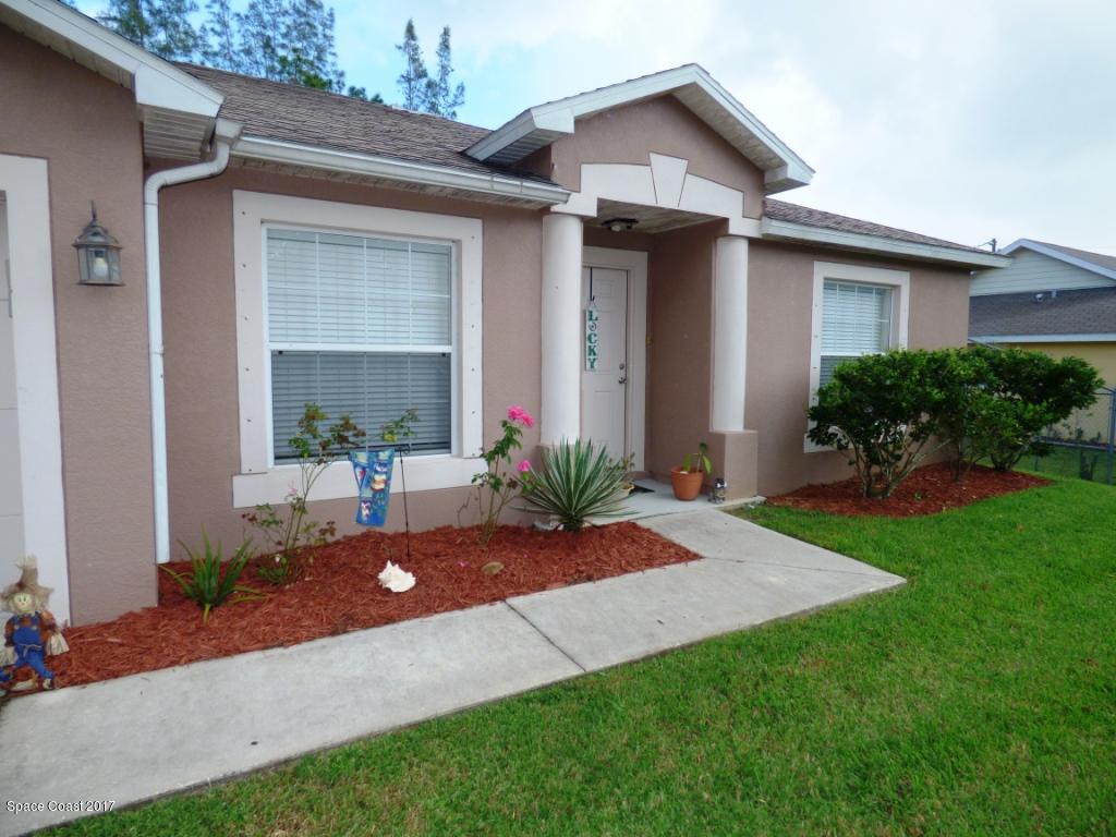841 Garvey Road Palm Bay, FL 32908 - Photo 3 of 27 Front Angle of Home
