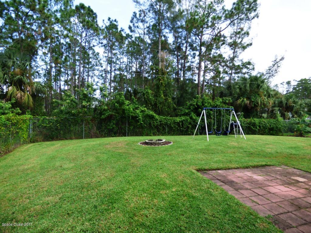 841 Garvey Road Palm Bay, FL 32908 - Photo 24 of 27 Spacious Back Yard