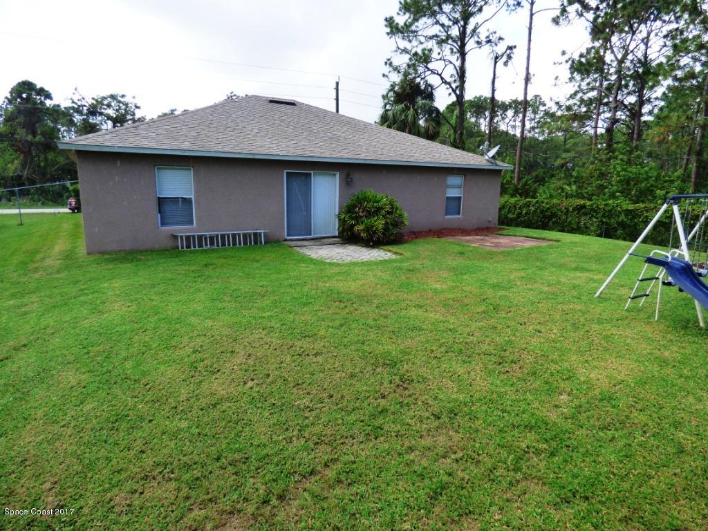 841 Garvey Road Palm Bay, FL 32908 - Photo 27 of 27 Another Angle of Exterior of Home