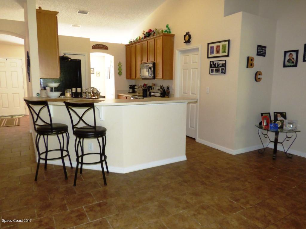 841 Garvey Road Palm Bay, FL 32908 - Photo 8 of 27 Tile everywhere except Bedrooms