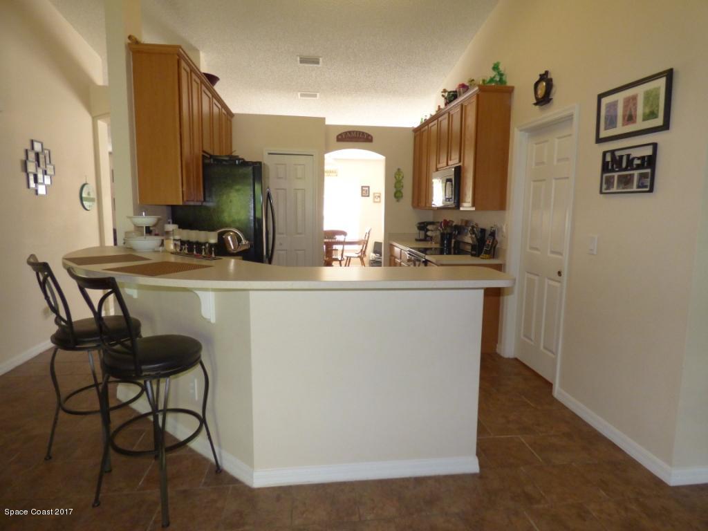 841 Garvey Road Palm Bay, FL 32908 - Photo 9 of 27 Oversized Breakfast Bar