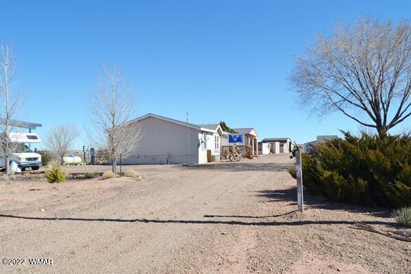 4915 Jack Rabbit Road Snowflake, AZ 85937 - Photo 56 of 56 a side view of a house with a yard