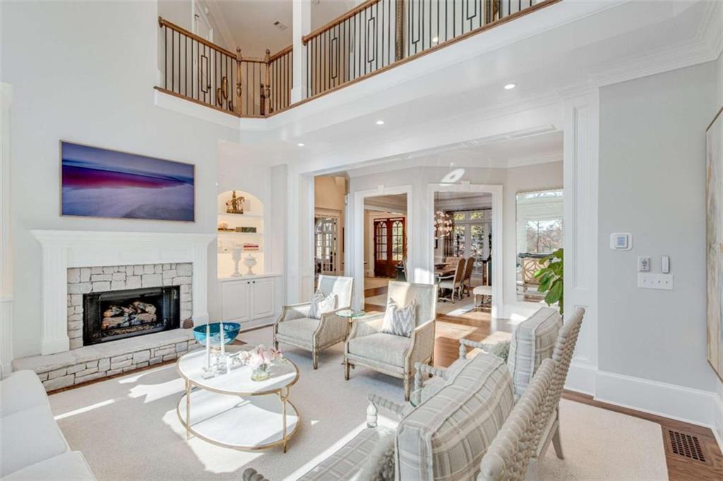 6226 Random Winds Bluff Gainesville, GA 30506 - Photo 14 of 76 a living room with furniture and a fireplace