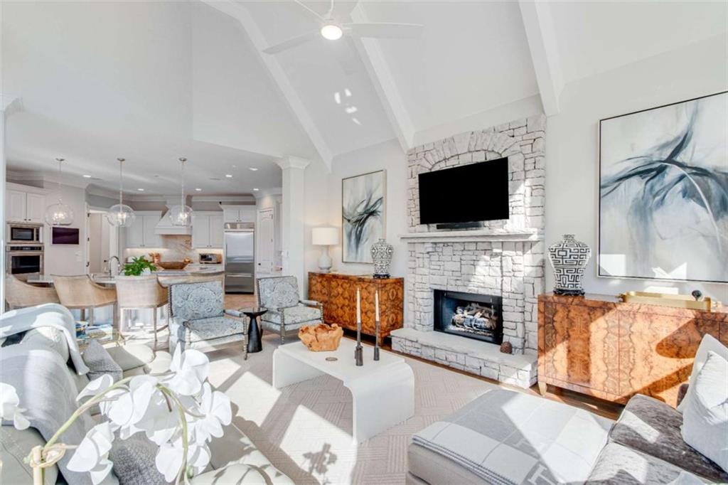 6226 Random Winds Bluff Gainesville, GA 30506 - Photo 23 of 76 a living room with furniture a fireplace and a flat screen tv