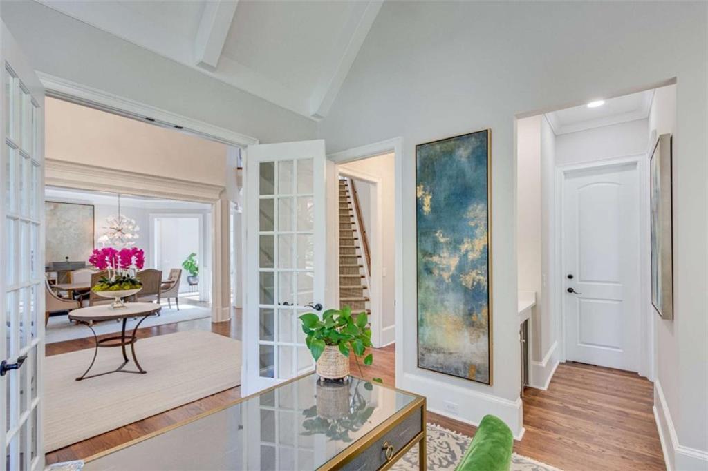 6226 Random Winds Bluff Gainesville, GA 30506 - Photo 26 of 76 a living room with furniture and a potted plant