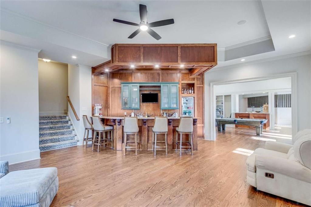 6226 Random Winds Bluff Gainesville, GA 30506 - Photo 50 of 76 a view of a dining room with furniture window and wooden floor