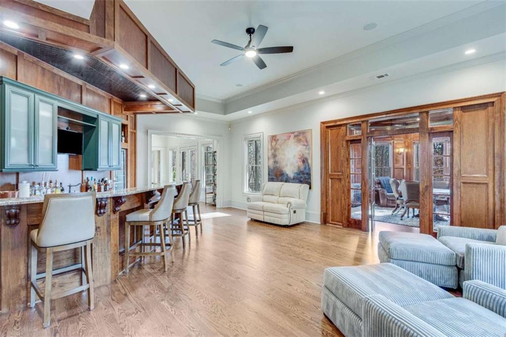 6226 Random Winds Bluff Gainesville, GA 30506 - Photo 52 of 76 a view of a livingroom with furniture and a large window