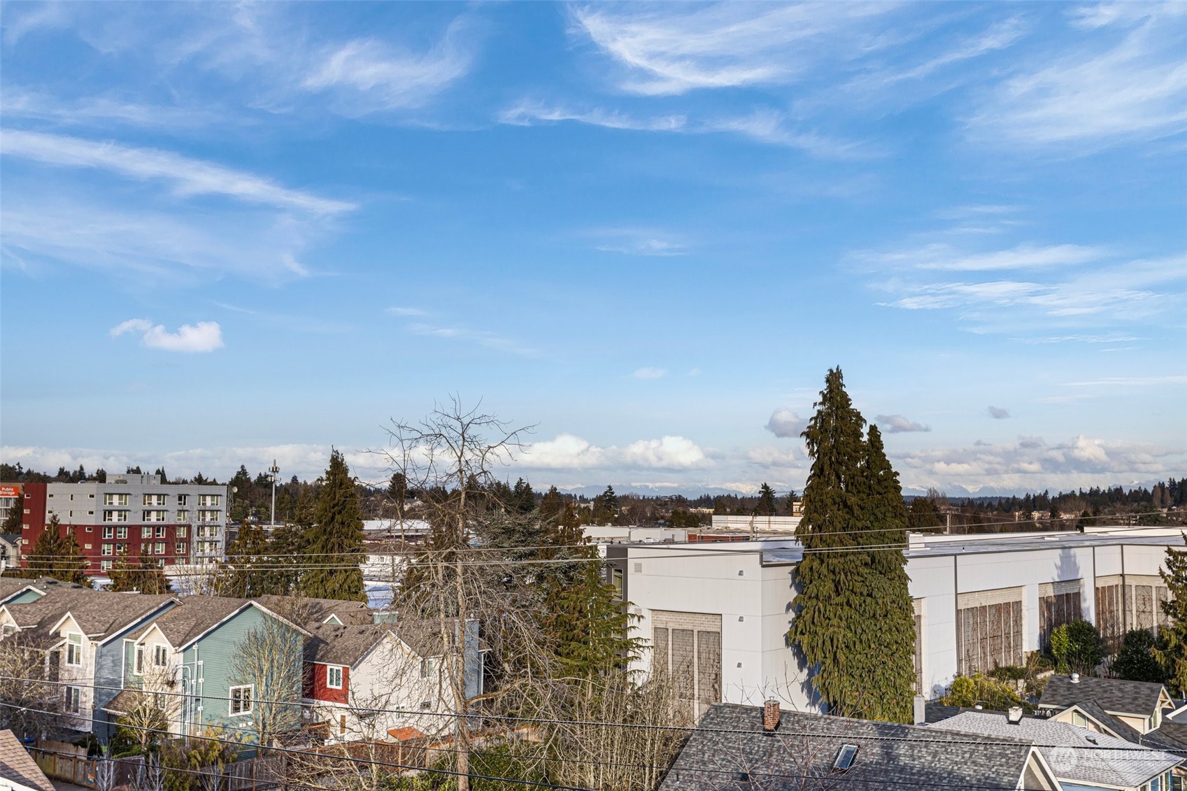 9221 Linden Avenue North, Unit B Seattle, WA 98103 - Photo 18 of 18 a view of a city with tall buildings