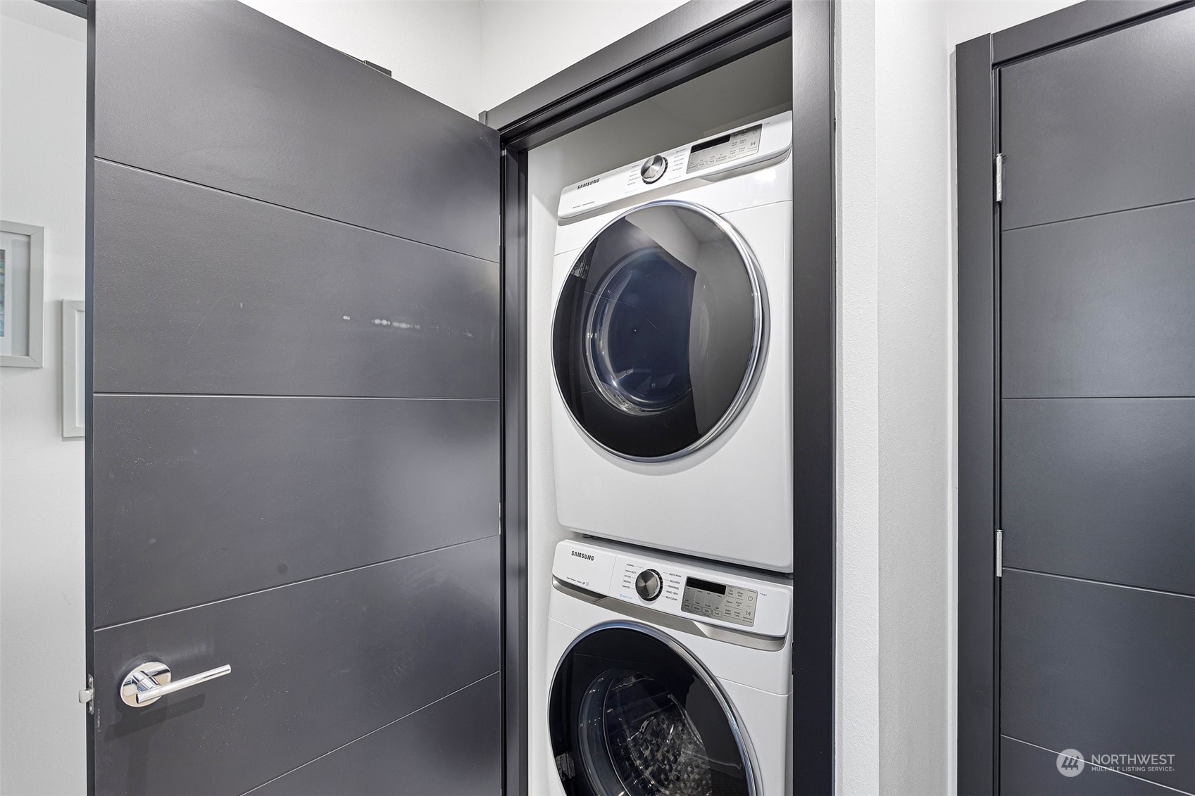 9221 Linden Avenue North, Unit B Seattle, WA 98103 - Photo 10 of 18 a utility room with dryer and washer