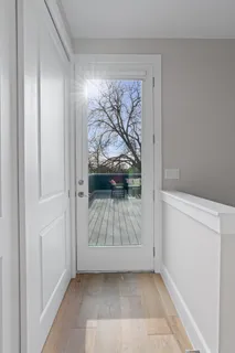 a view of a chairs and table on the deck