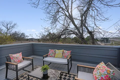 a view of balcony with city view