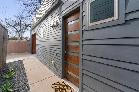a view of a door and wooden floor