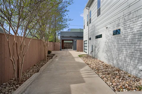 a view of a pathway with a house