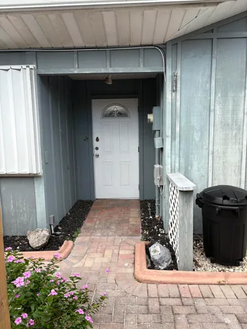 a view of a porch with a bench