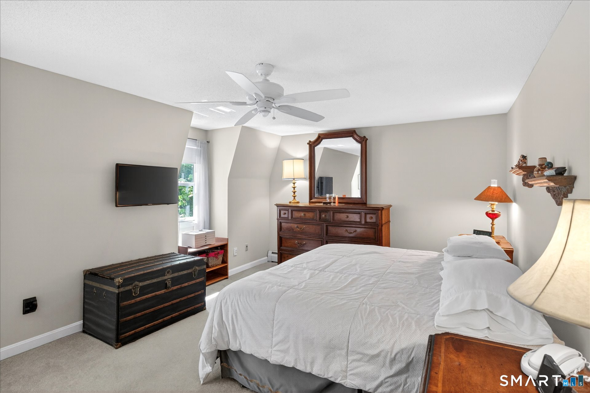 5 Shingle Mill Drive Canton, CT 06019 - Photo 24 of 38 a bedroom with a bed and a flat screen tv