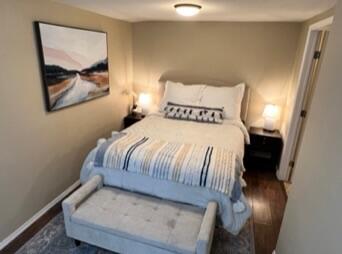 2309 17th Street Lubbock, TX 79401 - Photo 24 of 26 a bedroom with a bed and painting on the wall