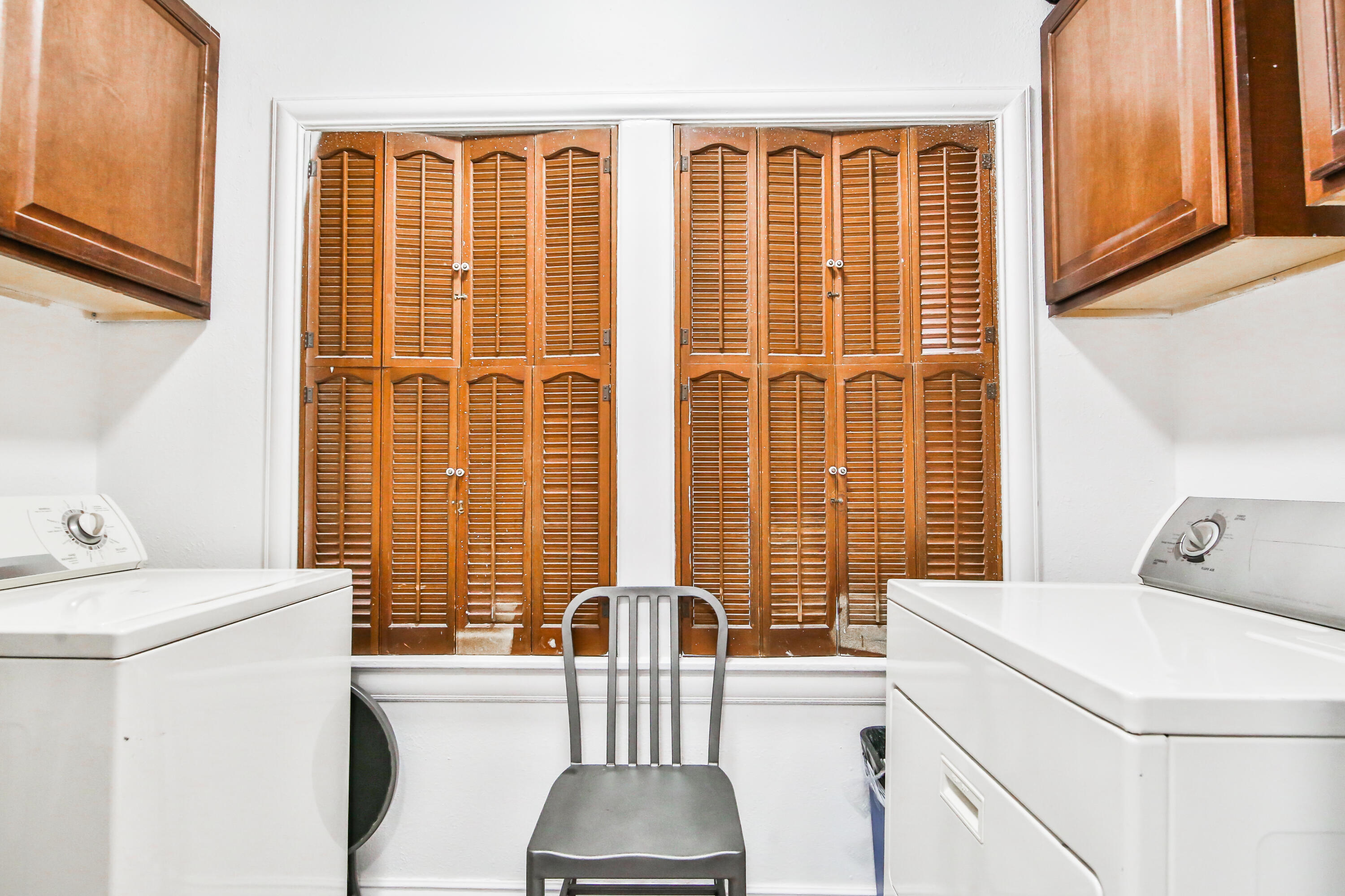 2309 17th Street Lubbock, TX 79401 - Photo 10 of 26 a bathroom with a sink and a washing machine