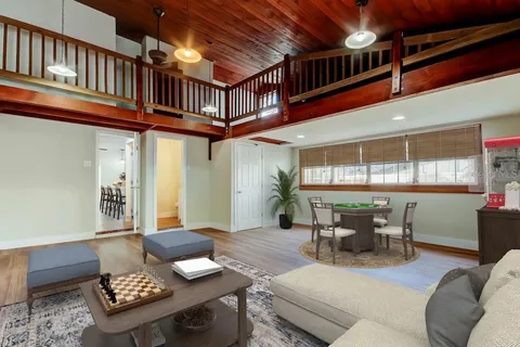 a outdoor living space with furniture and a window