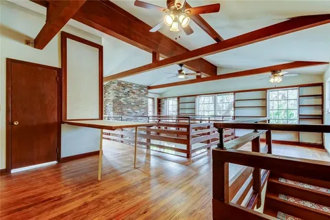 a view of swimming pool with furniture