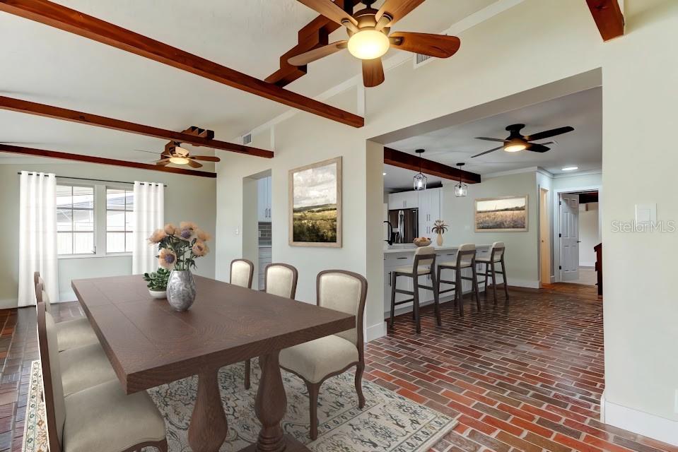 2901 Pelham Road North St. Petersburg, FL 33710 - Photo 8 of 32 a view of a dining room with furniture