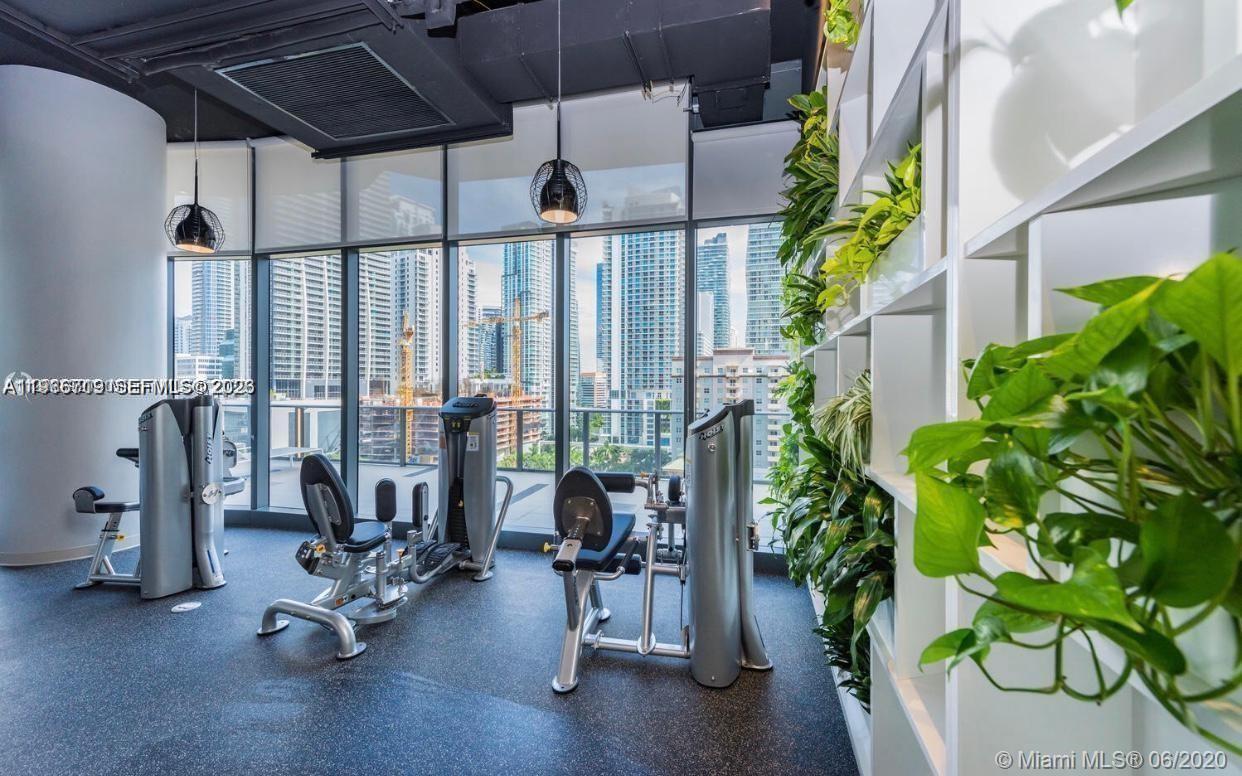 55 Southwest 9th Street, Unit 2307 Miami, FL 33130 - Photo 31 of 35 a view of a room with gym equipment