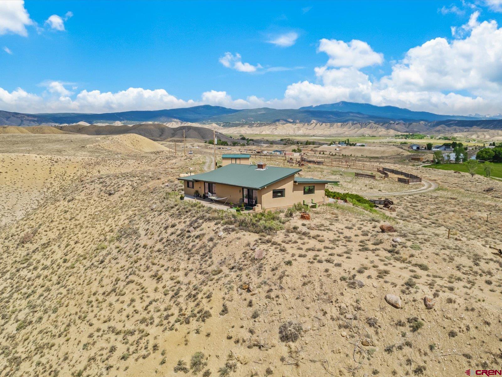 68149 Sunshine Road Montrose, CO 81401 - Photo 28 of 33 a view of a lake with a mountain in the background