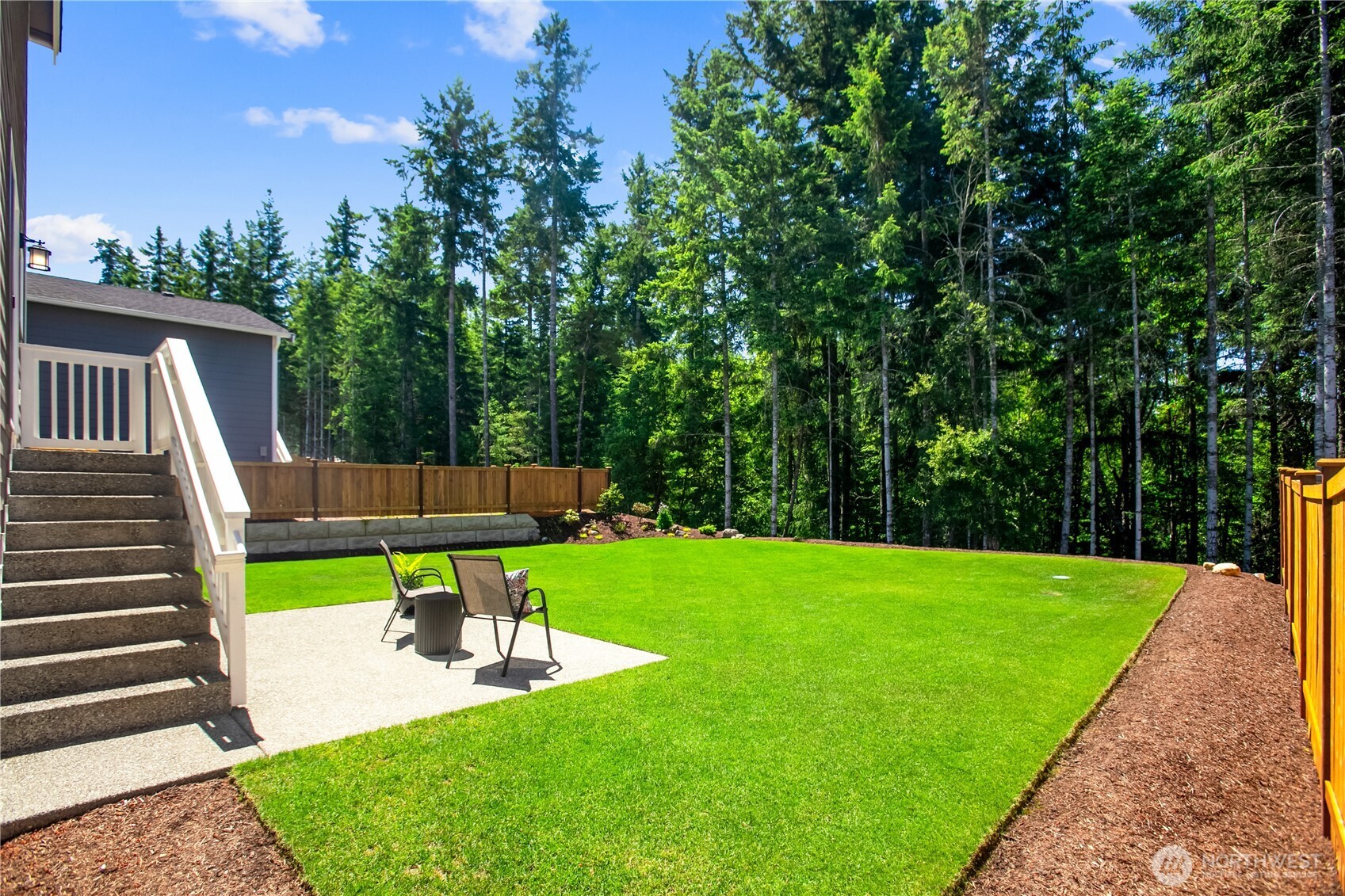 111 Northeast Ridgetop Crossing Belfair, WA 98528 - Photo 32 of 40 a view of a garden with an outdoor space