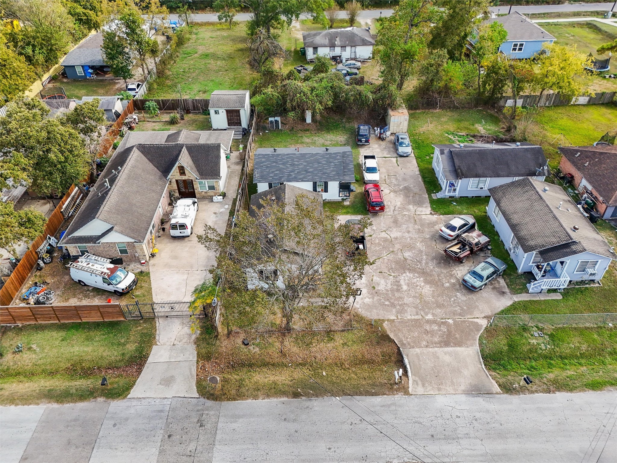 8514 Spaulding Street Houston, TX 77016 - Photo 11 of 19 an aerial view of a house with a garden and lake view