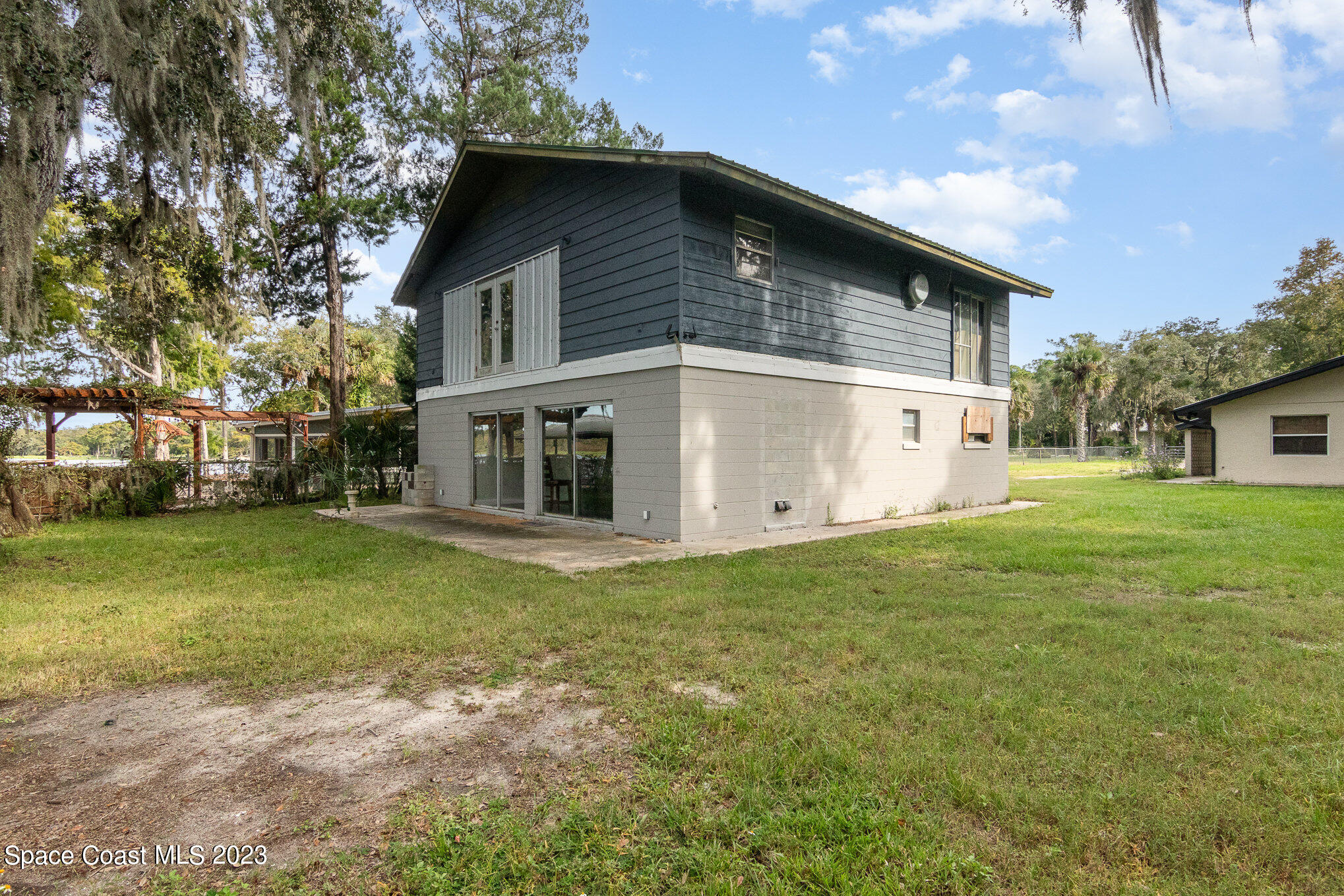 4091 Cypress Bend Geneva, FL 32732 - Photo 4 of 23 030_4085_and_4091_cypress_bend_aerial_ph