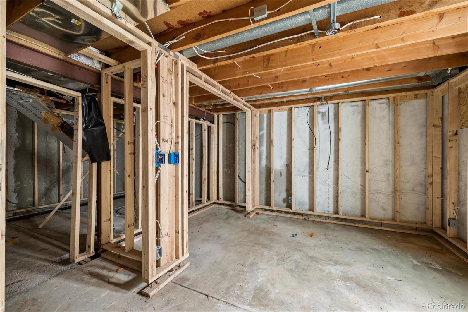 404 Neptune Court Lone Tree, CO 80124 - Photo 13 of 16 a view of a room with wooden walls