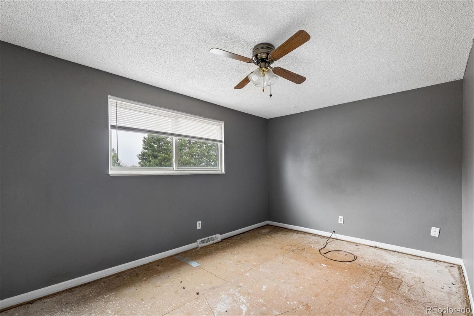 404 Neptune Court Lone Tree, CO 80124 - Photo 8 of 16 an empty room with a window