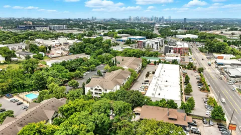 an aerial view of a city with lots of residential buildings