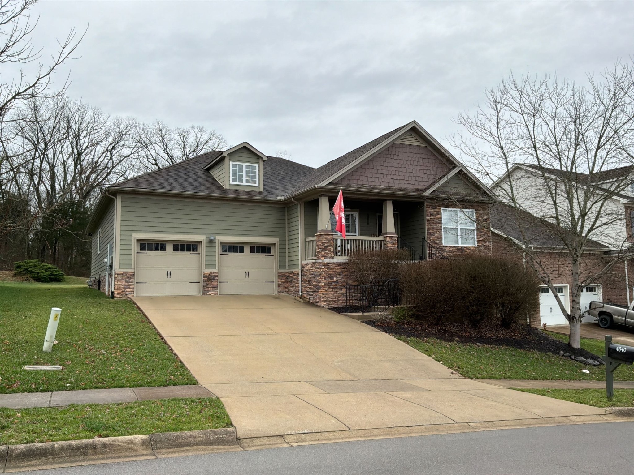 4840 Powder Springs Road Nolensville, TN 37135 - Photo 1 of 1 a front view of a house with a yard and garage