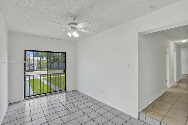a view of an empty room with window