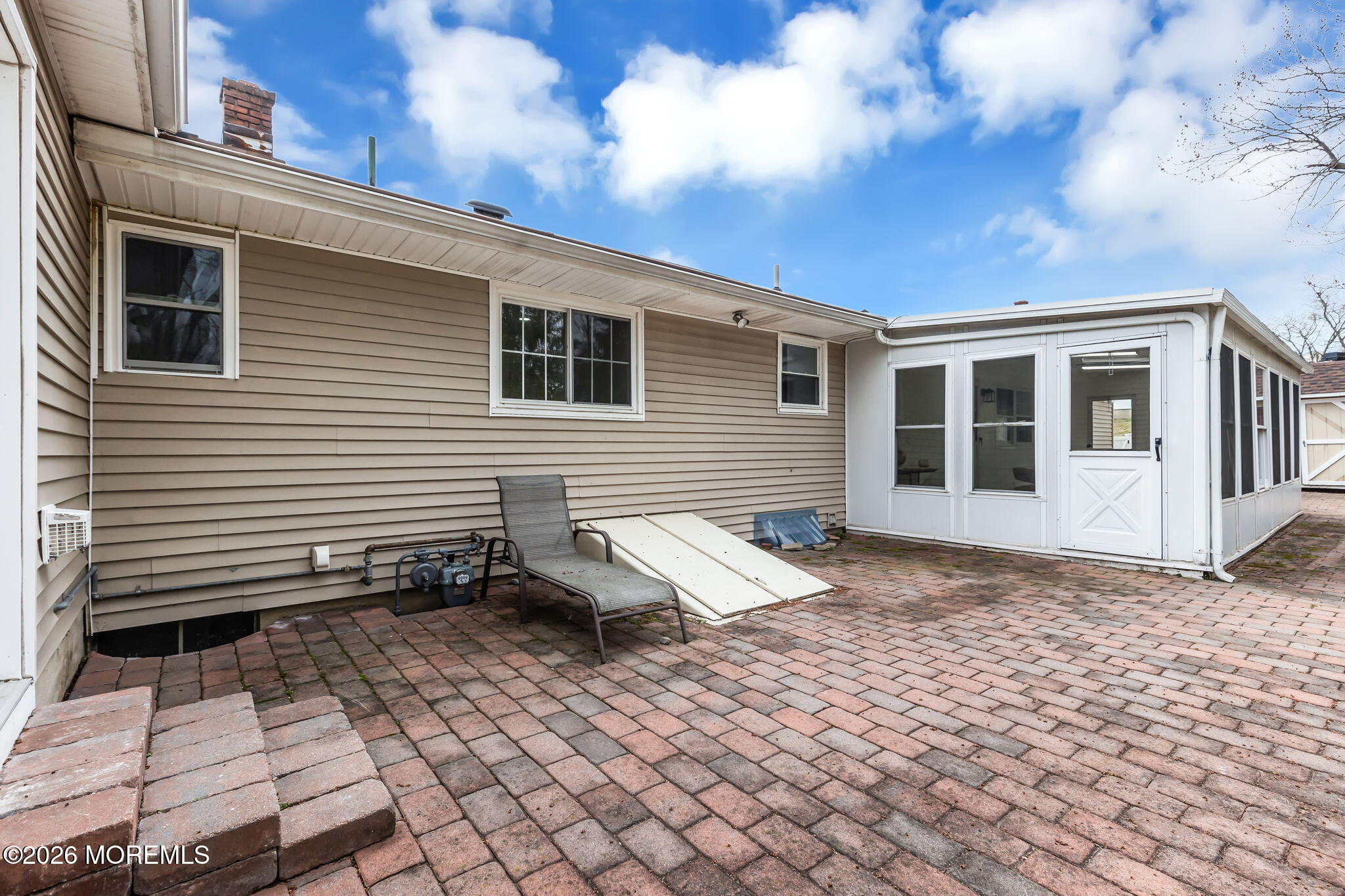 50 Westbrook Road Howell, NJ 07731 - Photo 66 of 73 a view of a house with a bench