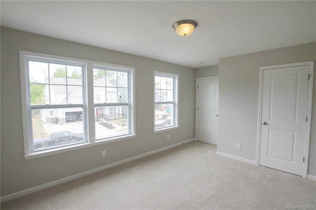 2254 Bluebell Way, Unit 156 Fort Mill, SC 29708 - Photo 14 of 23 a view of an empty room with a window