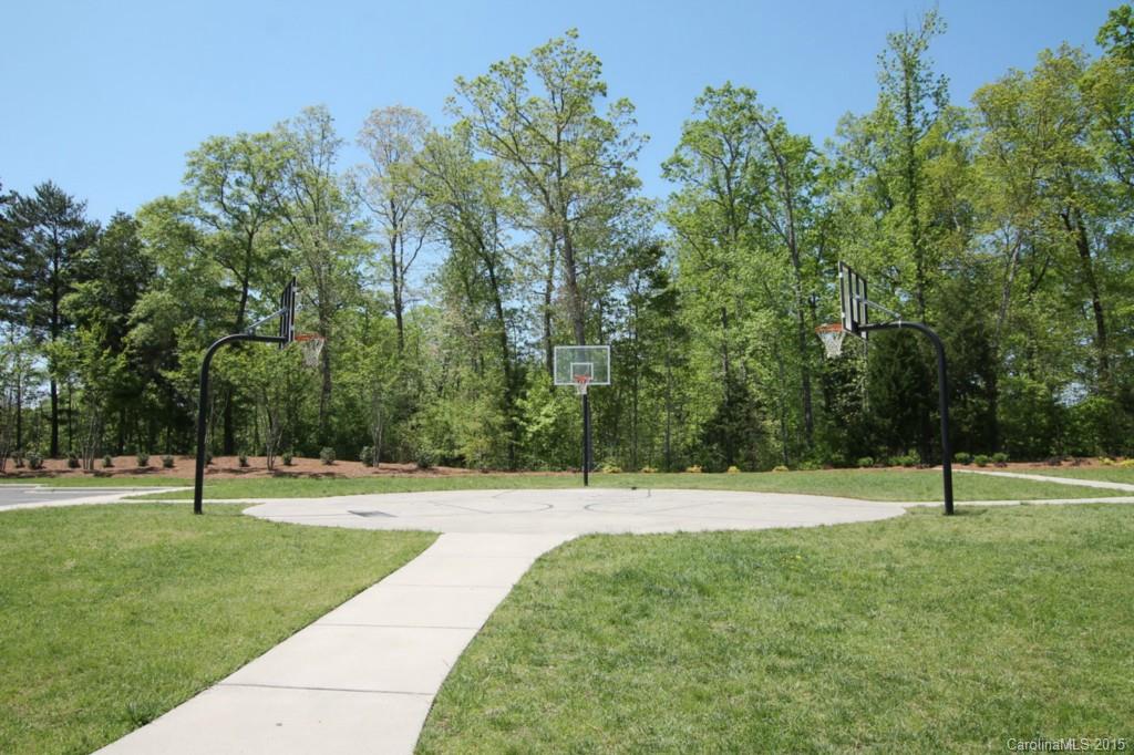2254 Bluebell Way, Unit 156 Fort Mill, SC 29708 - Photo 22 of 23 a view of a ground with a trees