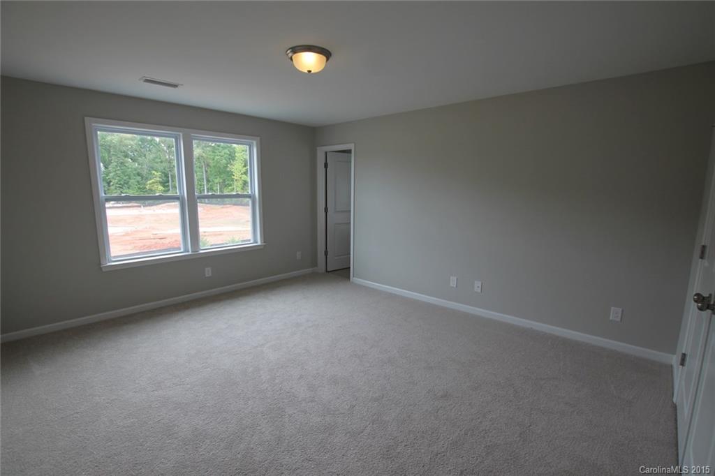 2254 Bluebell Way, Unit 156 Fort Mill, SC 29708 - Photo 10 of 23 an empty room with a window
