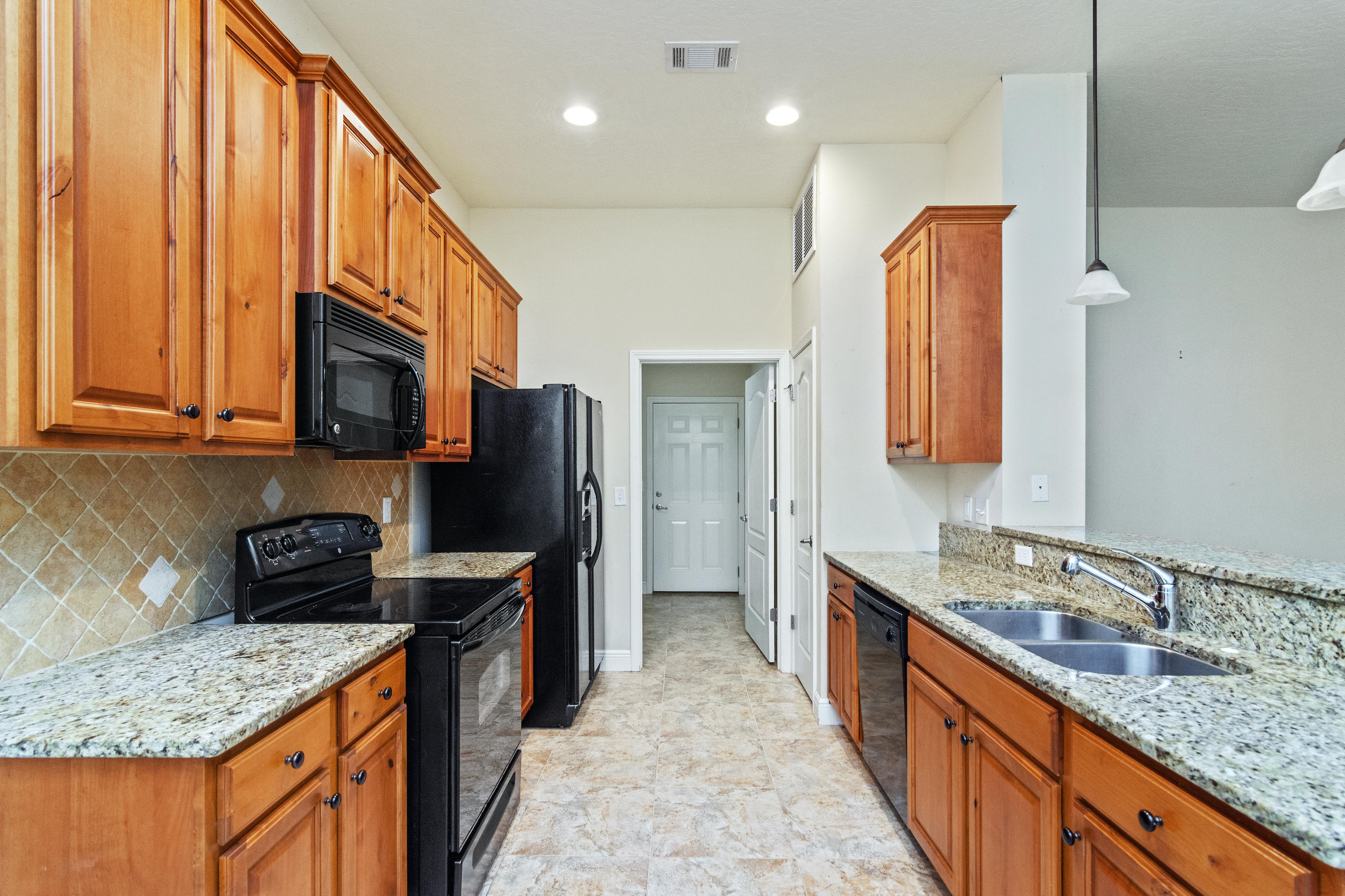 112 Pointer Lane Crestview, FL 32536 - Photo 9 of 28 kitchen into laundry room