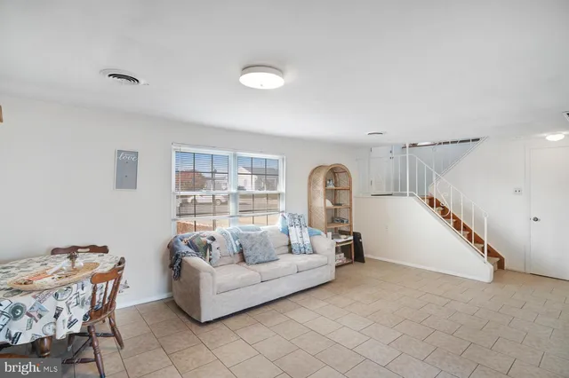 a view of a roof deck with patio