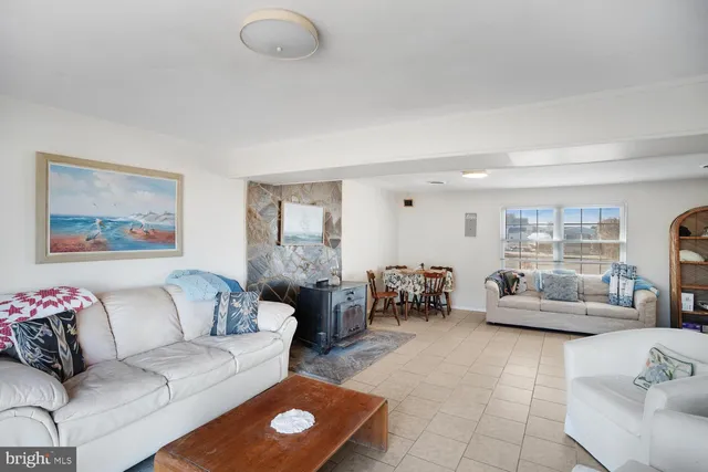 an aerial view of a house with a lake view