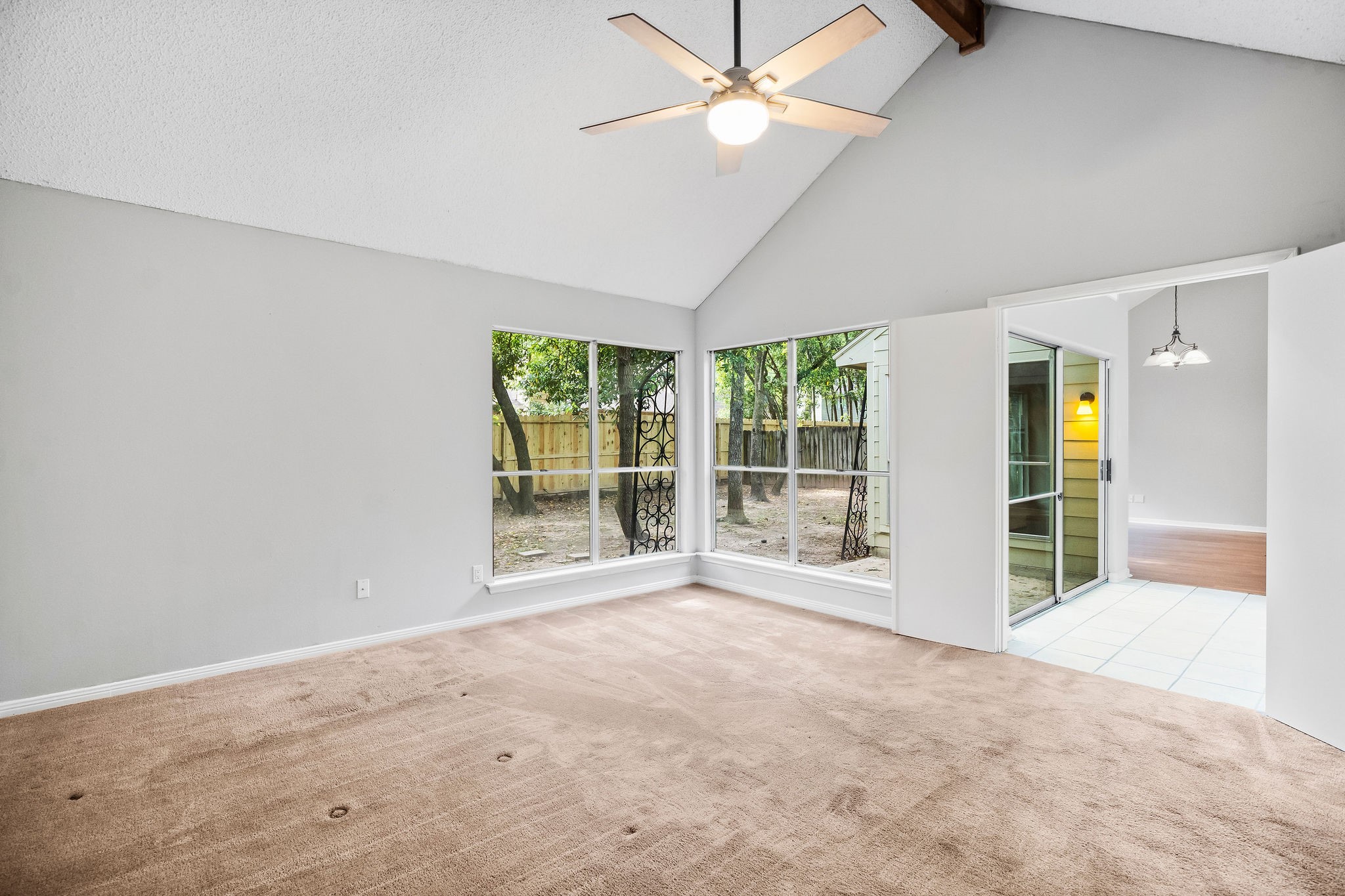 22 South Rain Forest Court Spring, TX 77380 - Photo 15 of 29 a view of an empty room with a window