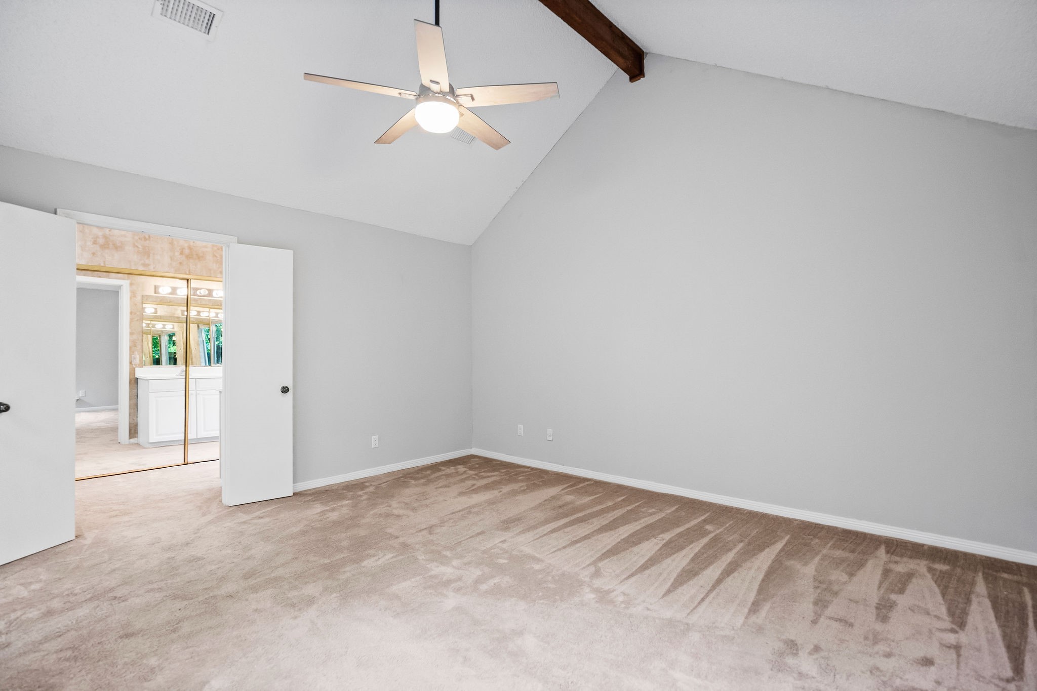 22 South Rain Forest Court Spring, TX 77380 - Photo 17 of 29 wooden floor in an empty room with a window
